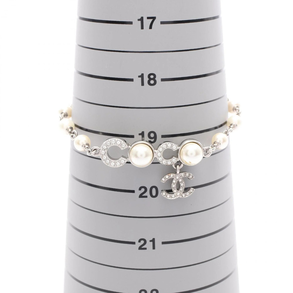 CHANEL White Pearl Logo Charm Bracelet - Picture 6 of 9